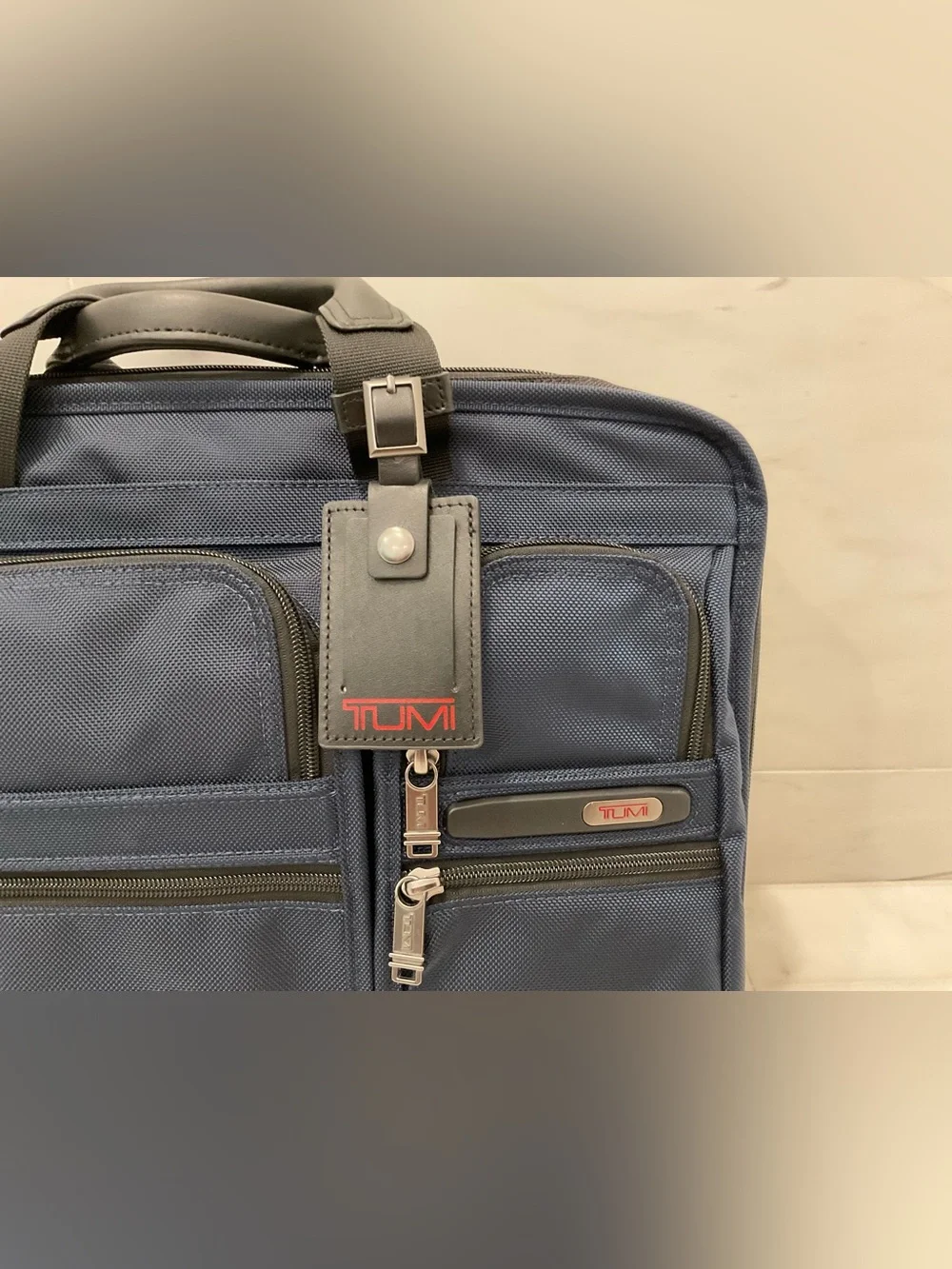 Tumi up sale